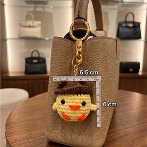 Handmade Crochet Duckling Keychain with Brown Hat – Cute Amigurumi Bag Charm